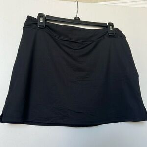 Black tennis skort. Size medium.